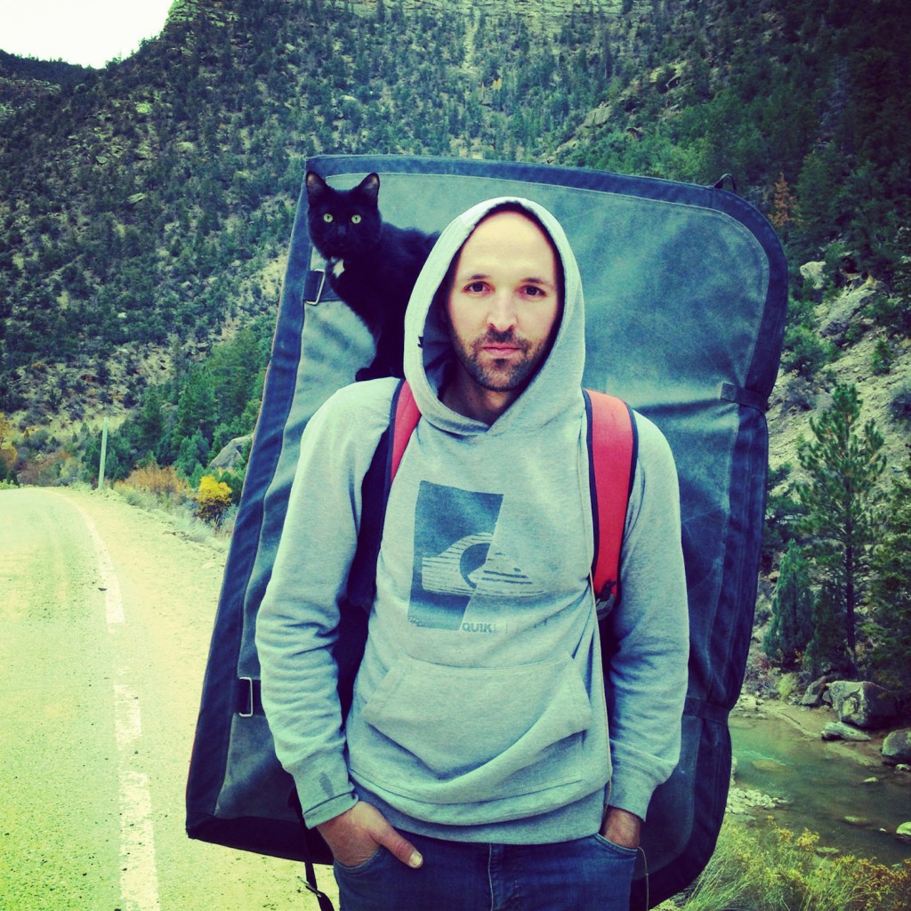 Craig Armstrong with cat Millie on shoulder