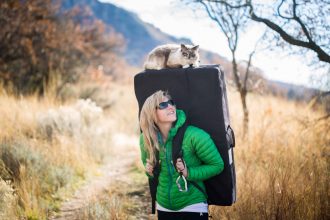 Lacy Taylor and her cat Zhiro on a hike