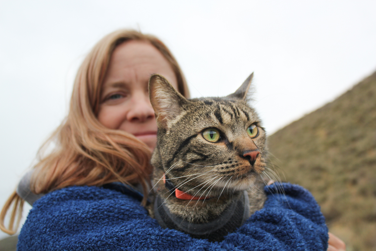 Woman holds cat